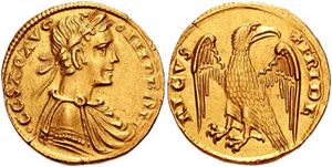 A gold coin, which depicts the bust of a man and an eagle