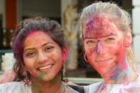 Two women celebrating Holi in Kathmandu, Nepal.