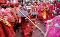 In the Braj region of North India, women have the option to playfully hit men who save themselves with shields; for the day, men are culturally expected to accept whatever women dish out to them. This ritual is called Lath Mar Holi.[19]