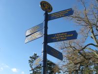 The Twinning Fingerpost in Cheltenham Township, Pennsylvania, United States, highlighting Cheltenham as the "Official Twin." The signpost points to other cities in the world named "Cheltenham".