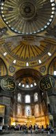 Interior view of the Hagia Sophia, showing Islamic elements on the top of the main dome (annotations).