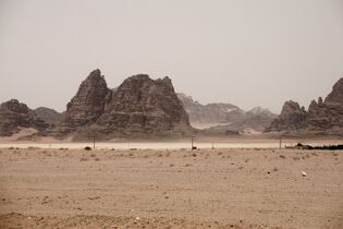 Wadi Rum rock formations along with Bedouin camps