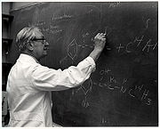 Julius Axelrod working at the blackboard on the structure of catecholamines
