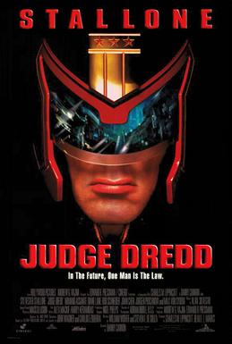 A headshot picture of Judge Dredd, wearing his helmet and with a view of Mega City One inside his glasses of the helmet. Below him there are the film's slogan, title, credits and release date.