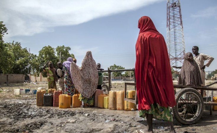 ملف:Women and children collect water in Mafa IDP camp, Borno state, north-east Nigeria.jpg