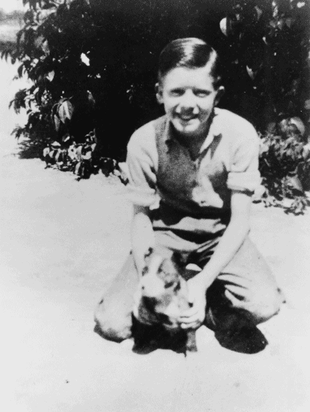 ملف:Jimmy Carter with his dog Bozo 1937.gif