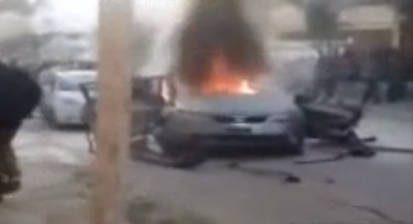 ملف:Burning car in Gaza after Israeli strike 2012.PNG