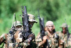 SEAL team members participate in a tactical warfare training