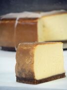 Cheesecake, a type of dessert with a layer of a mixture of soft, fresh cheese, eggs and sugar