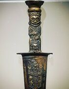 Bronze sword with a head-hunting theme from the Dian culture of ancient Yunnan (circa 100 BCE) unearthed at Jiancheng and displayed at Yunnan Provincial Museum, Guandu, Kunming, 2016.