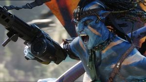 A blue humanoid alien wearing battle paint, holding a futuristic weapon.
