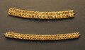 Two sets of golden beads