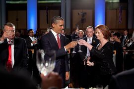 Wayne Swan, Barack Obama and Julia Gillard toast at a dinner at Parliament House in 2011.