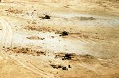 Battery of damaged Iraqi artillery in southern Iraq 1991-03-27.JPEG