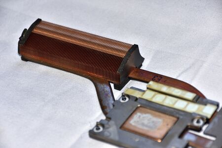 The working fluid in the heatpipes transfers heat away from the laptop's CPU and video processor over to the fin stack. Heat is dissipated from the fin stack by method of convective heat transfer from a fan. This fin stack is from an HP ZBook mobile workstation laptop.