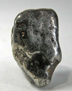 Awaruite is a nickel-iron alloy-bearing rock occurring as detritus in streams. This pebble/nugget weighs 13 grams.