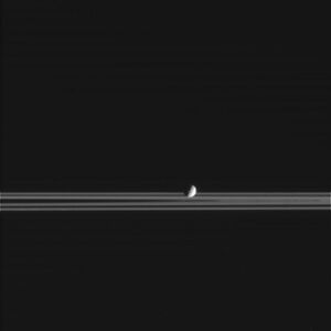 Cassini's image of Mimas passing in front of Saturn's rings, imaged on February 20, 2005.[38]