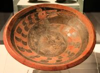 Painted Pottery Plate with Dragon Design Taosi Culture, Early Period (2,300—2,100 BCE) Excavated at the Taosi Site, Xiangfen County, Shanxi. Capital Museum, Beijing.