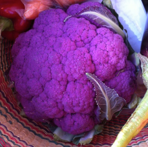 The purple colors of this cauliflower, grapes, fruits, vegetables and flowers comes from natural pigments called anthocyanins.