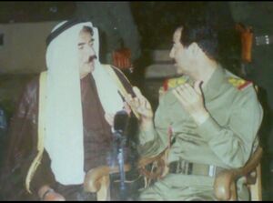 الشيخ أمين العلي الناصري والرئيس العراقي الاسبق صدام حسين.jpg