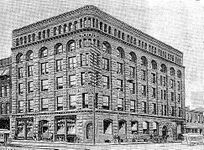 An 1891 image of the 1889 Power Building, named after magnate Thomas C. Power[108]