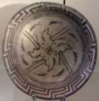 The Samarra bowl, from Iraq, circa 4,000 BCE, held at the Pergamonmuseum, Berlin. The swastika in the centre of the design is a reconstruction.[85]