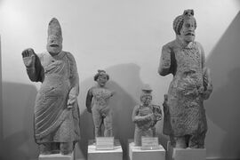 From left to right, an unidentified ruler, Hermes, a female deity, and Sanatruq I.From Hatra. Erbil Civilization Museum