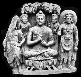Gandhara Buddhist Triad from Sahr-i-Bahlol, 132 CEح. 132 CE, similar to the dated Brussels Buddha.[35] Peshawar Museum.[36][37]