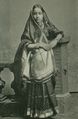Girl in Gujarati sari; in this style, the loose end is worn on the front.