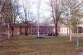 Old cavalry barracks, now housing The Infantry Museum. The former parade ground is in the foreground