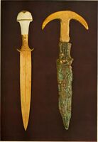 A gold dagger and a dagger with a gold-plated handle, Ur excavations (1900).