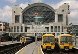 An image of Charing Cross Station with Southeastern trains at the platform.