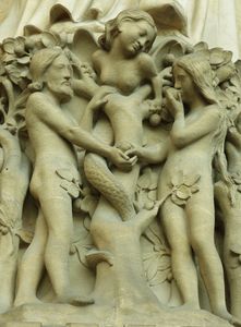 The serpent tempts Adam and Eve; part of the Last Judgement on the central portal of west facade
