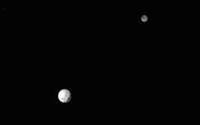 June 2015: Pluto (left) and its moon Charon, taken by the New Horizons space probe.