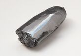 One half of a ruthenium bar. Size ~ 40 × 15 × 10 mm Weight ~44 g