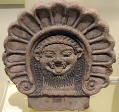 Roof ornament with Medusa's head. Etruscan, from Italy, 6th century BC. National Museum of Scotland, Edinburgh