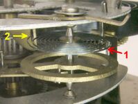 A spiral torsion spring, or hairspring, in an alarm clock.