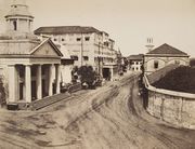 The Court-House Building on Apollo Street, Bombay (third building on left, just beyond the domed Ice House) shown in 1850.