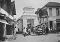 A paduraksa-like structure marking the entrance to the mosque compound.