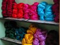 Dyed silk yarns for weaving saris.