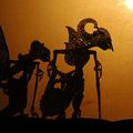 Wayang kulit as seen by the audienceShadow puppets have a long history in China, India, Turkey and Java, and as a popular form of entertainment for both children and adults in many countries around the world. A shadow puppet is a cut-out figure held between a source of light and a translucent screen. Translucent color is sometimes introduced into the cut-out shapes to provide a different look and different effects can be achieved by moving both the puppet and the light source. A talented puppeteer can make the figures walk, dance, fight, nod and laugh.