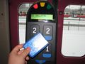Smartcard being used to pay for public transportation in the Helsinki area.