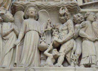 Archangel Michael and Satan weighing souls during the Last Judgement (central portal, west facade)
