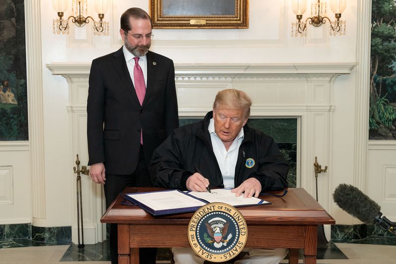 ملف:President Trump Signs the Congressional Funding Bill for Coronavirus Response (49627907646).jpg