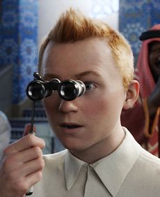 A computer-illustrated, realistic-looking image of Tintin, a screenshot from his new movie