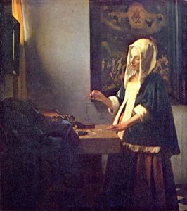 Woman Holding a Balance, c.1665 by Vermeer[2]