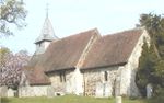Example of a small village church in Pyrford, Surrey, إنگلترة