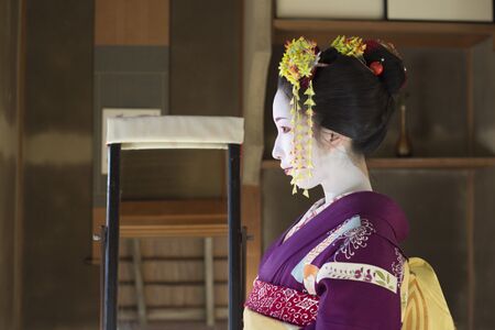 A Japanese woman in a kimono.