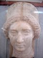 A bust from The متحف إيران الوطني of Queen Musa, wife of Phraates IV of Parthia.