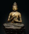 A gilt-wood statue of Vairocana Buddha, Heian period, 11th-12th century